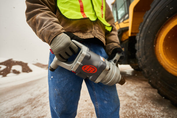 Pneumatic impact wrench 2955B2 1 1/2" Ingersoll Rand 6100 Nm is held in your hands ready for use with a view of the right-hand side.