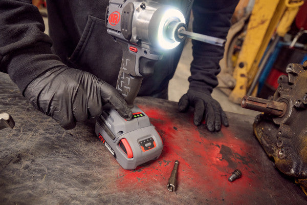 AKKU impact wrench W3111 20V 1/4" Hex Ingersoll Rand in angled side view on the right with illuminated LED light ring
